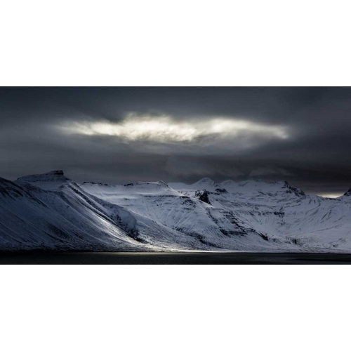 Iceland Sunlight bursts through storm clouds